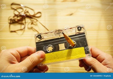 Man rewind a cassette tape stock image. Image of mono - 120448995