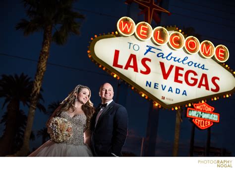 Bride and Groom in Front of Las Vegas Welcome Sign - Favourite Wedding Photos - Raph Nogal ...