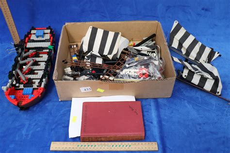 Lot - 1990'S LEGO PIRATE SHIP & 5 ON A TREASURE ISLAND BOOK