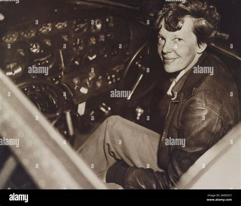 Amelia Earhart in the cockpit of her Lockheed Model 10-E Electra aircraft Stock Photo - Alamy