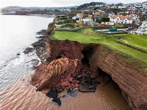 Dramatic pictures show huge chunk of rock lying in the sea after cliff ...