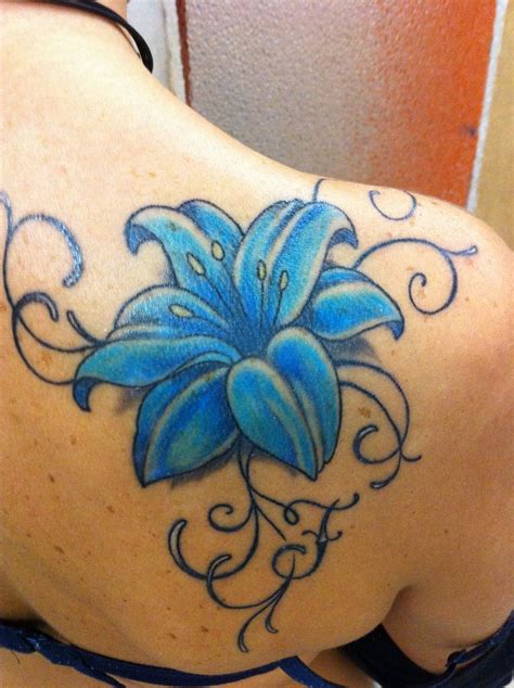 Blue Lily tattoo perfect to cover existing tattoo Calla Lily Tattoos, Tiger Lily Tattoos, Tiger ...