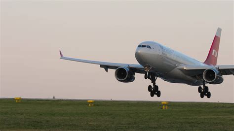 KAZAN, RUSSIA AUGUST 05, 2022 - Middle shot of Airbus A330 Nordwind landing and braking at Kazan ...