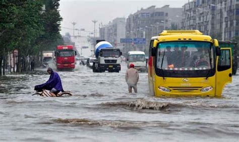 Chinese flood forces mass evacuation | CBC News