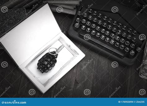 Hand Grenade Hidden in a Book Stock Photo - Image of black, bullet: 176953094