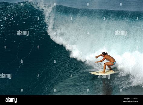 Girl surfing at Honolua Bay Maui Hawaii Stock Photo - Alamy