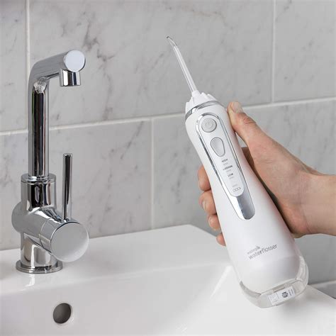 Waterpik Cordless Water Flosser Rechargeable Portable Oral irrigator for Travel & Home ...