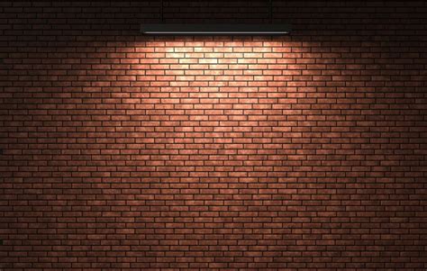 Premium Photo | Brick wall with light