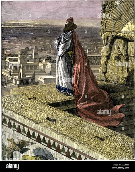 King Nebuchadnezzar II overlooking the city of Babylon 8th century BC. Hand-colored woodcut ...