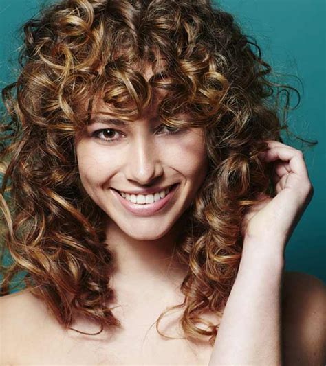 Curly Hair? You Need to Try Straight Bangs. Here's Why.