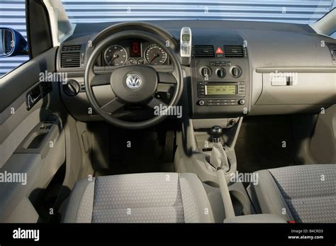 Car, VW Volkswagen Touran TDI, Van, model year 2003-, blue, interior view, Interior view ...