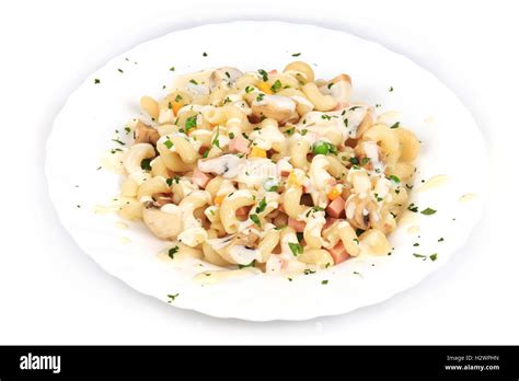 Pasta with mushrooms and white sauce Stock Photo - Alamy