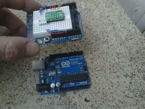 Insertiing the motor shield onto the arduino uno - Motors, Mechanics ...