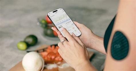 Woman Measuring Blood Sugar level with a Smart Phone App · Free Stock Photo