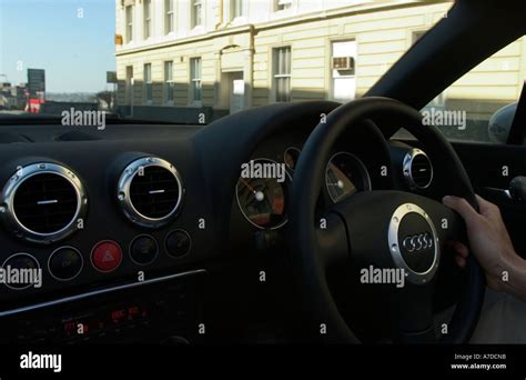 driving Audi TT dashboard & wheel Stock Photo - Alamy