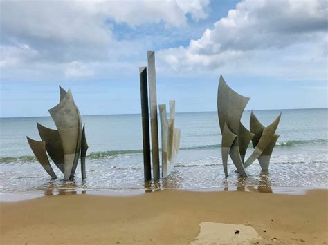 Remembering The Fallen: Paying Tribute On Normandy's Historic Beaches - Niger Cultures