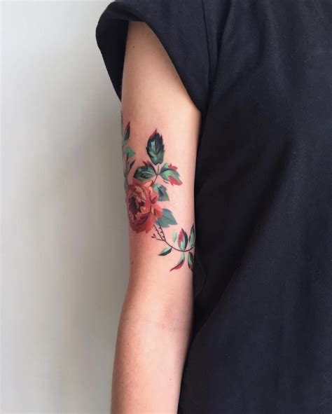 Beautiful and simple flower on the arm - Tattoogrid.net