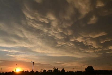 Mammatus clouds at sunset. Photo by Melanie Bourret, Saskatoon, SK. | Mammatus clouds, Sunrise ...