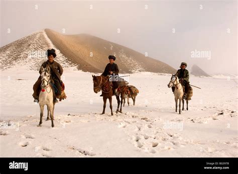 Afghan horsemen in a mountain near Turkmenistan border in Faryab ...