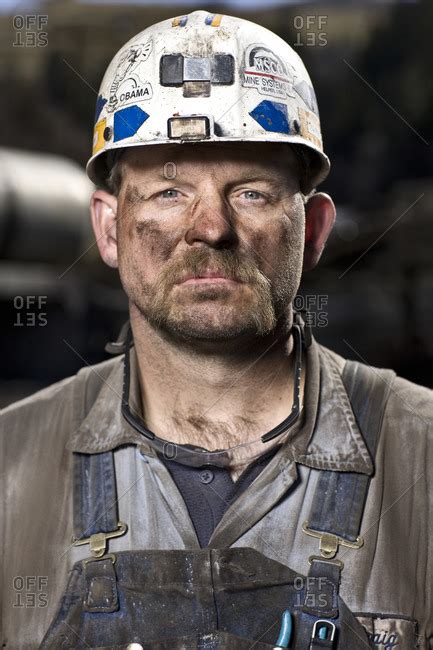 Portrait of a coal miner stock photo - OFFSET