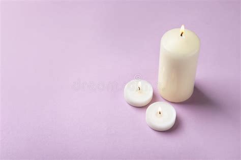 Burning Wax Candles of Different Shapes Stock Photo - Image of copy, candlelight: 117036028