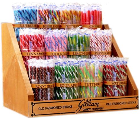 This Classic Candy Stick Display comes with 12 plastic jars, jar labels & a sturdy wood stand ...