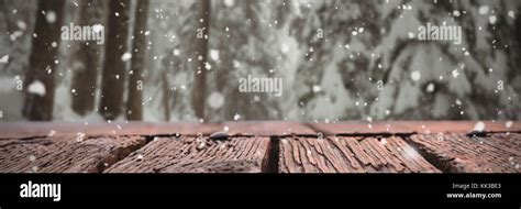 Snow falling against pine trees covered in snow Stock Photo - Alamy