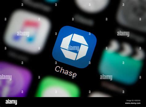 A close-up shot of the logo representing Chase Bank app icon, as seen on the screen of a smart ...