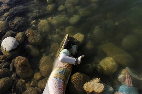 Photos show how industrial pollution and human waste are killing India's sacred river Ganges