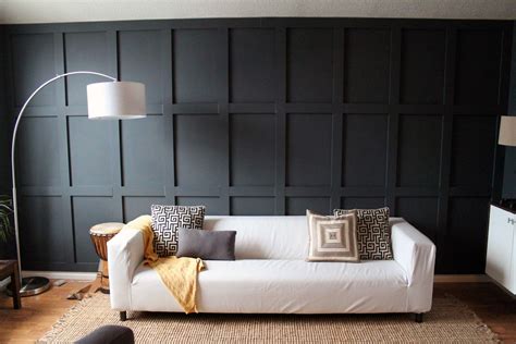 Chic Black Wood Panel Wall in a Contemporary Living Room | Wainscoting styles, Black wainscoting