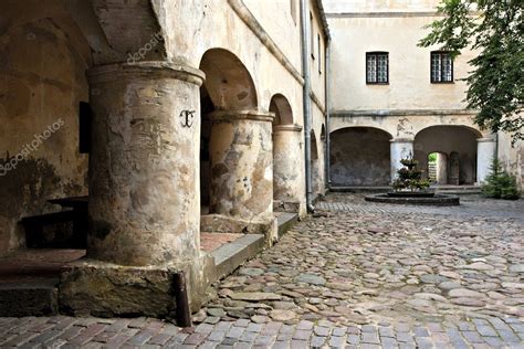 Medieval castle courtyard. — Stock Photo © MartinsL #6336842