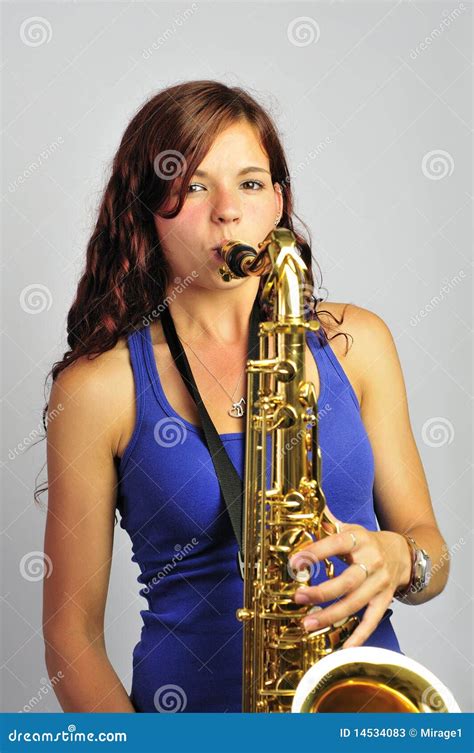 Girl Playing Tenor Saxophone Stock Image - Image of dark, teens: 14534083