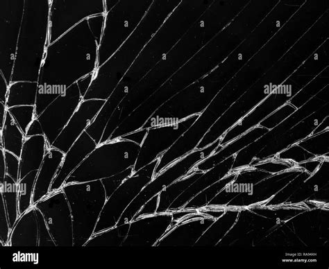 Cracked glass texture on black background. Isolated realistic cracked ...