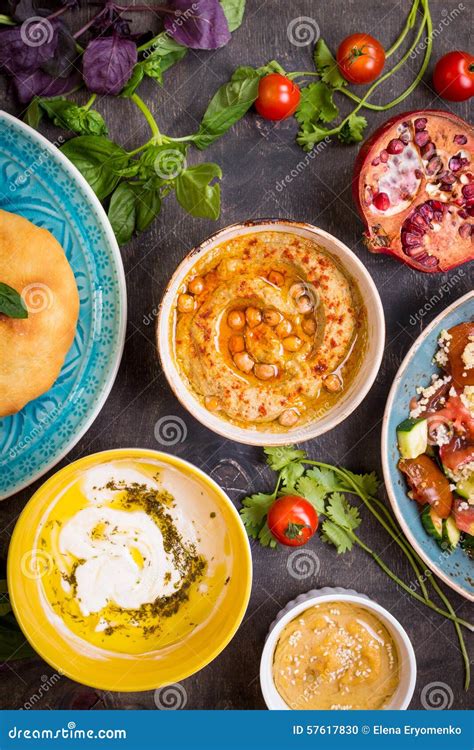 Table Served with Middle Eastern Vegetarian Dishes. Hummus, Tahi Stock Photo - Image of eastern ...