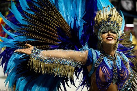 A samba dancer takes part in a parade at Anhembi Sambadrome as part of the carnival celebrations ...