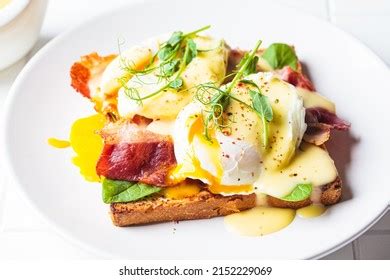 Eggs Benedict On Crispy Toast Bacon Stock Photo 2152229069 | Shutterstock