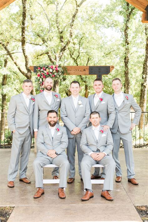 | groomsmen in light gray suits | groomsmen with hot pink boutonnieres | summer groomsmen party ...