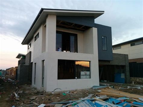 Surf Mist render colour and fascia. Dulux Signature cladding, Colorbond Monument and Austral ...