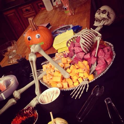 Halloween party food. Skeleton spilling his guts | Halloween food for party, Charcuterie board ...