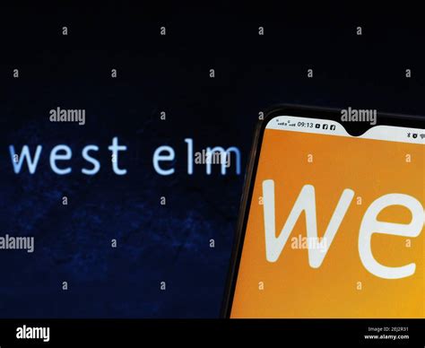 In this photo illustration a West Elm company logo seen displayed on a ...