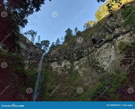 Coban Rondo waterfall stock image. Image of beautiful - 220995251