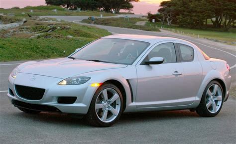 Mazda RX-8 Photos and Specs. Photo: Mazda RX-8 specs and 25 perfect photos of Mazda RX-8