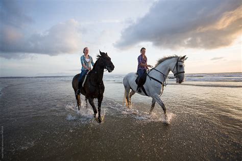 "Women Horse Riding On Beach At Sunset." by Stocksy Contributor "Hugh ...