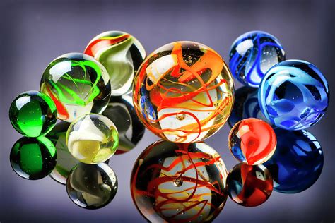 Glass Toy Marbles Reflection Photograph by Garry Gay - Pixels