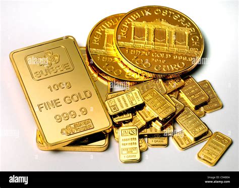 Gold bullion - coins and bars / ingots (gold-plated replicas Stock Photo - Alamy