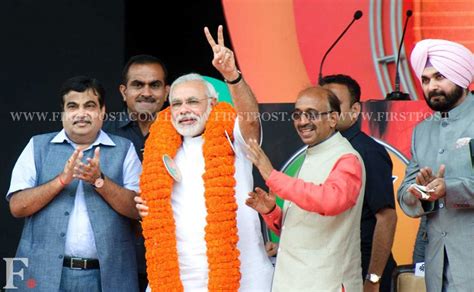 Photos: Narendra Modi woos audience at BJP Delhi rally - Photos News , Firstpost