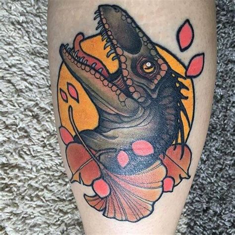 Little shiny but All healed velociraptor tattoo.