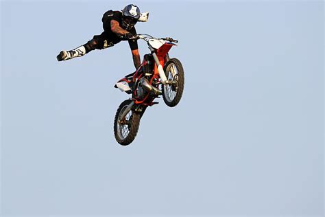 Dirt Bike Stunts - In The Air VIII Photograph by Debbie Oppermann