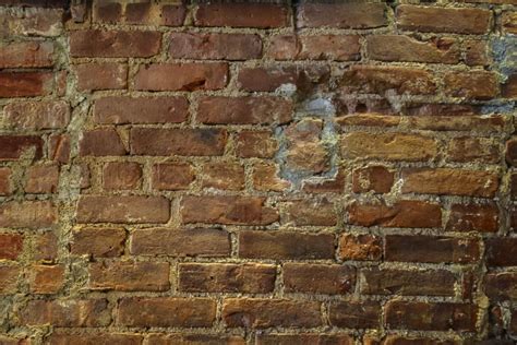 Full frame shot of damaged brick wall - StockFreedom - Premium Stock Photography