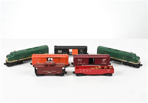 Sold at Auction: VINTAGE LIONEL O GAUGE MODEL TRAINS & TRACKS